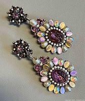 Front view of both earrings showing overall design and stones