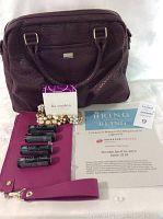 Photo of dark brown textured pebble handbag, Lia Sophia pearl-like necklace, Avon lipsticks, and Bring on the Bling event tickets: shows all lot items together.