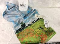 Full view of Monet print silk scarf with labels showing House of Angelis Fashion Emporium and price tags.