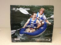 Front view of boxed kayak showing Aquaglide branding and product image