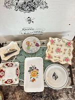 All six porcelain trinket dishes displayed