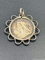 Obverse of coin pendant with Queen Victoria in bezel