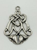 Front view of pendant showing open-work design