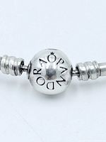 Close-up of Pandora barrel clasp showing logo detail