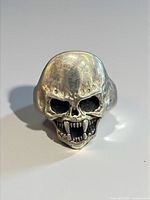 Front view of sterling silver skull ring showing facial detail