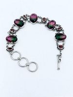 Full view of sterling silver bracelet with watermelon tourmaline stones and toggle clasp