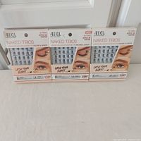 Front view of three sealed Ardell Naked Trios boxes