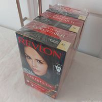 Three sealed Revlon Colorsilk boxes front view