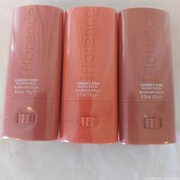 Front view of three sealed blush sticks showing Florence branding and 0.3 oz / 9 g weight