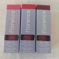 Front view of three boxed Florence by Mills Be A VIP Velvet Liquid Lipsticks