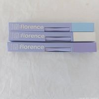 Three boxed eyeliners stacked showing Florence branding