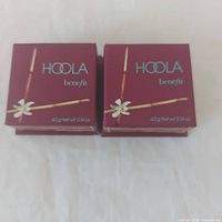 Front view of two Benefit Hoola boxed bronzers