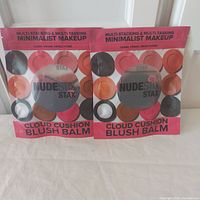 Two sealed NudeStix Cloud Cushion Blush Balm packages front view