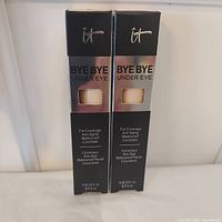 Front view of both sealed concealer boxes