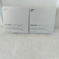 Front view of both sealed powder boxes