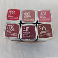 Six Maybelline lipstick bases showing shade numbers and names