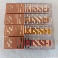 All four sealed Sunkisser blush tubes aligned horizontally