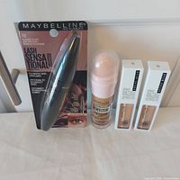 All four sealed Maybelline products grouped