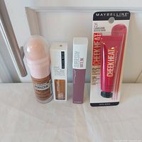 Group shot of all four sealed Maybelline products