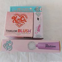 Boxed Kim Chi makeup items grouped