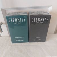 Both sealed Eternity For Men boxes side by side
