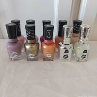 Front view of all 10 Sally Hansen Miracle Gel bottles