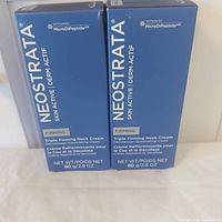 Front view of two boxed Neostrata Skin Active Triple Firming Neck Creams