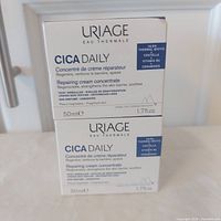 Front view of both sealed Uriage Cica Daily cream boxes