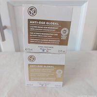 Front view of two boxed Yves Rocher Anti-Age Global 75 ml skincare treatments