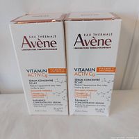 Front view of two sealed Avene Vitamin Activ Cg Serum boxes