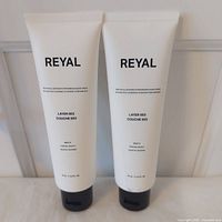 Two Reyal Layer 003 moisturizer tubes front view
