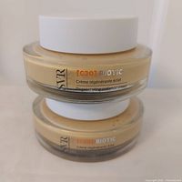 Two stacked SVR [C20] Biotic cream jars front view