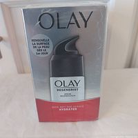 Front view of one sealed Olay Regenerist Serum Hydrator box