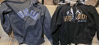 Both hoodies side by side showing overall style and color