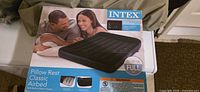 Boxed Intex Pillow Rest Classic full-size airbed showing product and specifications