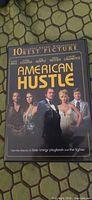 Front cover of American Hustle DVD case