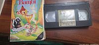 Front cover of clamshell case with Bambi artwork and VHS cassette
