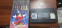 Front of Fantasia clamshell case beside VHS cassette