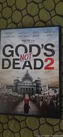 Front cover of God's Not Dead 2 DVD case