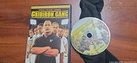 Front cover of Gridiron Gang DVD case and disc artwork