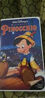 Front of clamshell case showing Pinocchio artwork