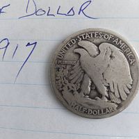Reverse side of 1917 Walking Liberty half dollar showing eagle and denomination