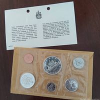 Front view of one sealed 1967 Centennial coin set with information card