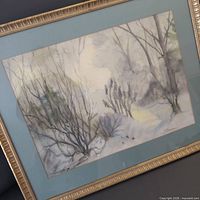 Full view of framed watercolor landscape with mat and frame