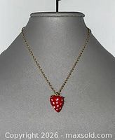 Necklace displayed on bust showing overall appearance