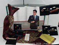 Overall lot including boxed handkerchiefs, clip-on tie, four jewelry display cards holding tie bars and tack