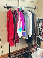 Full view of rack with jackets lined on hangers