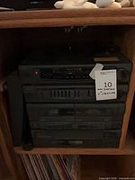 stack of four GPX stereo components on shelf