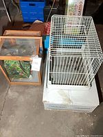 Both enclosures side by side on floor