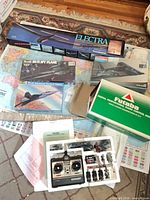Group shot showing all boxed kits and Futaba transmitter set